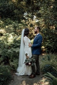 Beautiful Bride and Groom at Sunset in Green Nature planned by Wedding Event Planners.