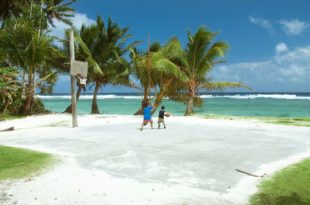 Playing basketball on the beach sand