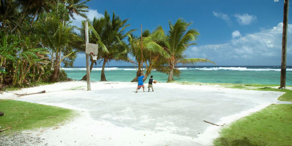 Playing basketball on the beach sand